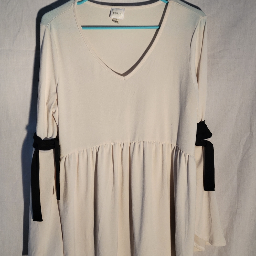 Cupio Bell Sleeve Blouse